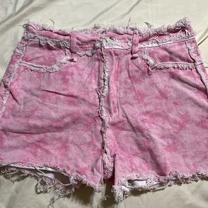 Pink tye dye jean shorts medium sized